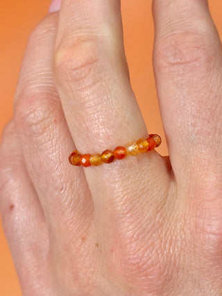 CARNELIAN - CRYSTAL STRETCH RING WITH FACETED BEADS Bracelet The Crystal Avenues