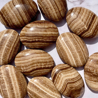 CHOCOLATE CALCITE PALM STONE Palmstone The Crystal Avenues