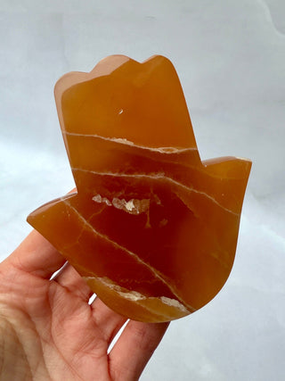 HONEY CALCITE HAMSA (4) Palmstone The Crystal Avenues