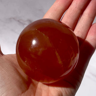 HONEY CALCITE SPHERE (3) Palmstone The Crystal Avenues