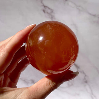 HONEY CALCITE SPHERE (3) Palmstone The Crystal Avenues