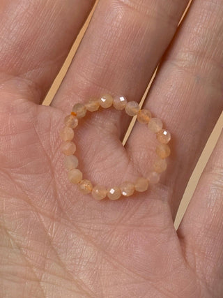 PEACH MOONSTONE - CRYSTAL STRETCH RING WITH FACETED BEADS Bracelet The Crystal Avenues