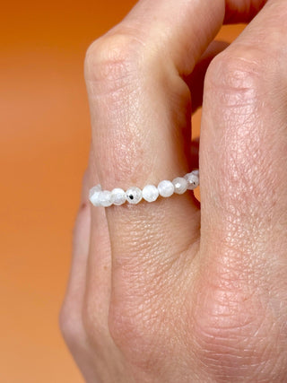 RAINBOW MOONSTONE - CRYSTAL STRETCH RING WITH FACETED BEADS Bracelet The Crystal Avenues
