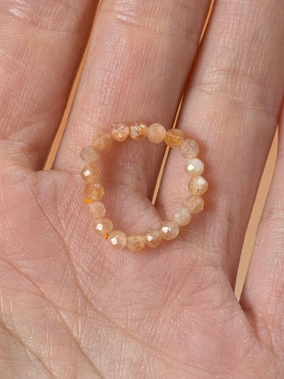 SUNSTONE - CRYSTAL STRETCH RING WITH FACETED BEADS Bracelet The Crystal Avenues