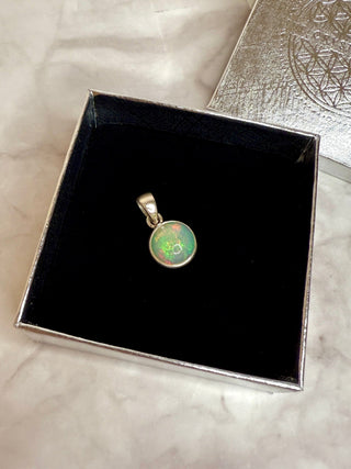 WHITE ETHIOPIAN OPAL SILVER PENDANT (NO. 5) The Crystal Avenues
