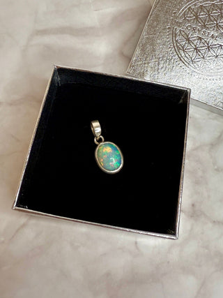 WHITE ETHIOPIAN OPAL SILVER PENDANT (NO. 7) The Crystal Avenues