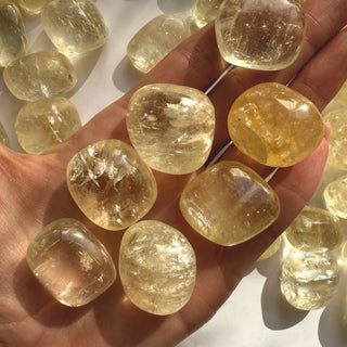 YELLOW OPTICAL CALCITE TUMBLE STONE Tumble Stone The Crystal Avenues