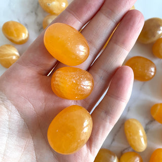 ORANGE CALCITE EXTRA QUALITY TUMBLE STONE tumble stone The Crystal Avenues
