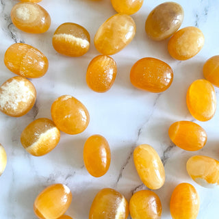 ORANGE CALCITE EXTRA QUALITY TUMBLE STONE tumble stone The Crystal Avenues