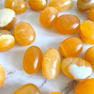 ORANGE CALCITE EXTRA QUALITY TUMBLE STONE tumble stone The Crystal Avenues