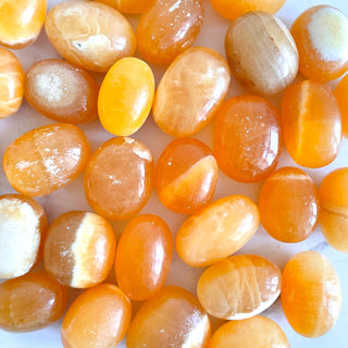 ORANGE CALCITE EXTRA QUALITY TUMBLE STONE tumble stone The Crystal Avenues