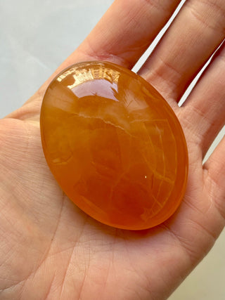 HONEY CALCITE PALM STONE (1) Palmstone The Crystal Avenues 
