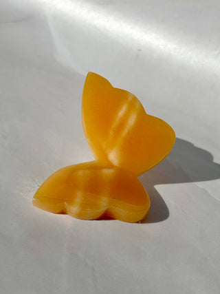 MANGO CALCITE BUTTERFLY (1) tumble stone The Crystal Avenues 