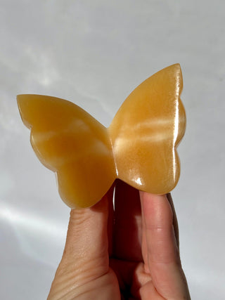 MANGO CALCITE BUTTERFLY (1) tumble stone The Crystal Avenues 