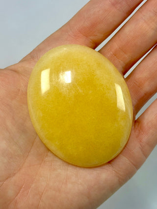 MANGO CALCITE PALM STONE (3) tumble stone The Crystal Avenues 