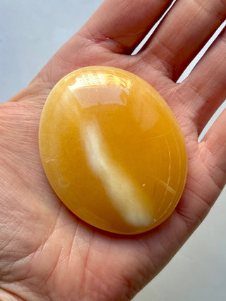 MANGO CALCITE PALM STONE (5) tumble stone The Crystal Avenues 