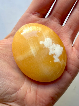 MANGO CALCITE PALM STONE (6) tumble stone The Crystal Avenues 