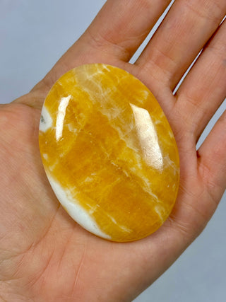 ORANGE CALCITE PALM STONE (3) tumble stone The Crystal Avenues 