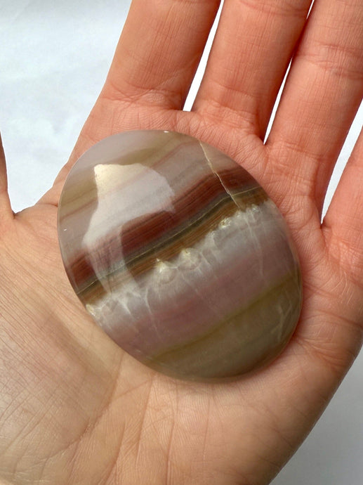 PINK BANDED ONYX PALM STONE (2) tumble stone The Crystal Avenues 