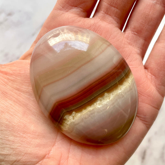 PINK BANDED ONYX PALM STONE (4) tumble stone The Crystal Avenues 