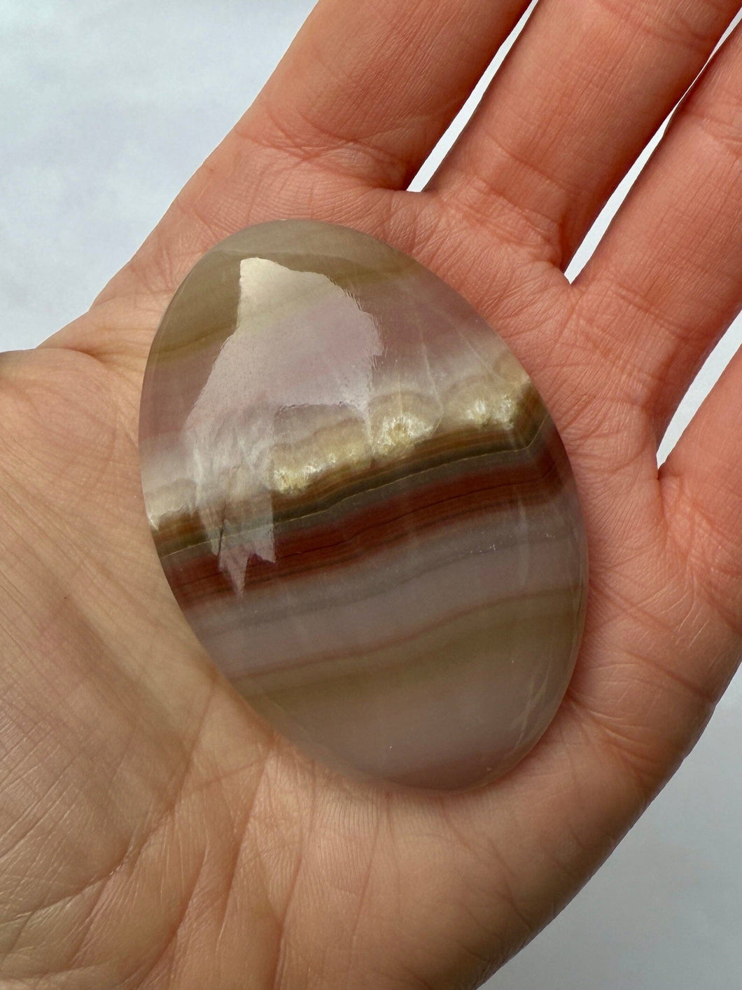 PINK BANDED ONYX PALM STONE (4) tumble stone The Crystal Avenues 