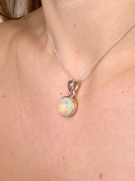 WHITE ETHIOPIAN OPAL SILVER PENDANT (NO. 5) The Crystal Avenues 