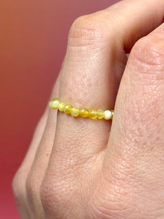 YELLOW OPAL - CRYSTAL STRETCH RING WITH FACETED BEADS Bracelet The Crystal Avenues 